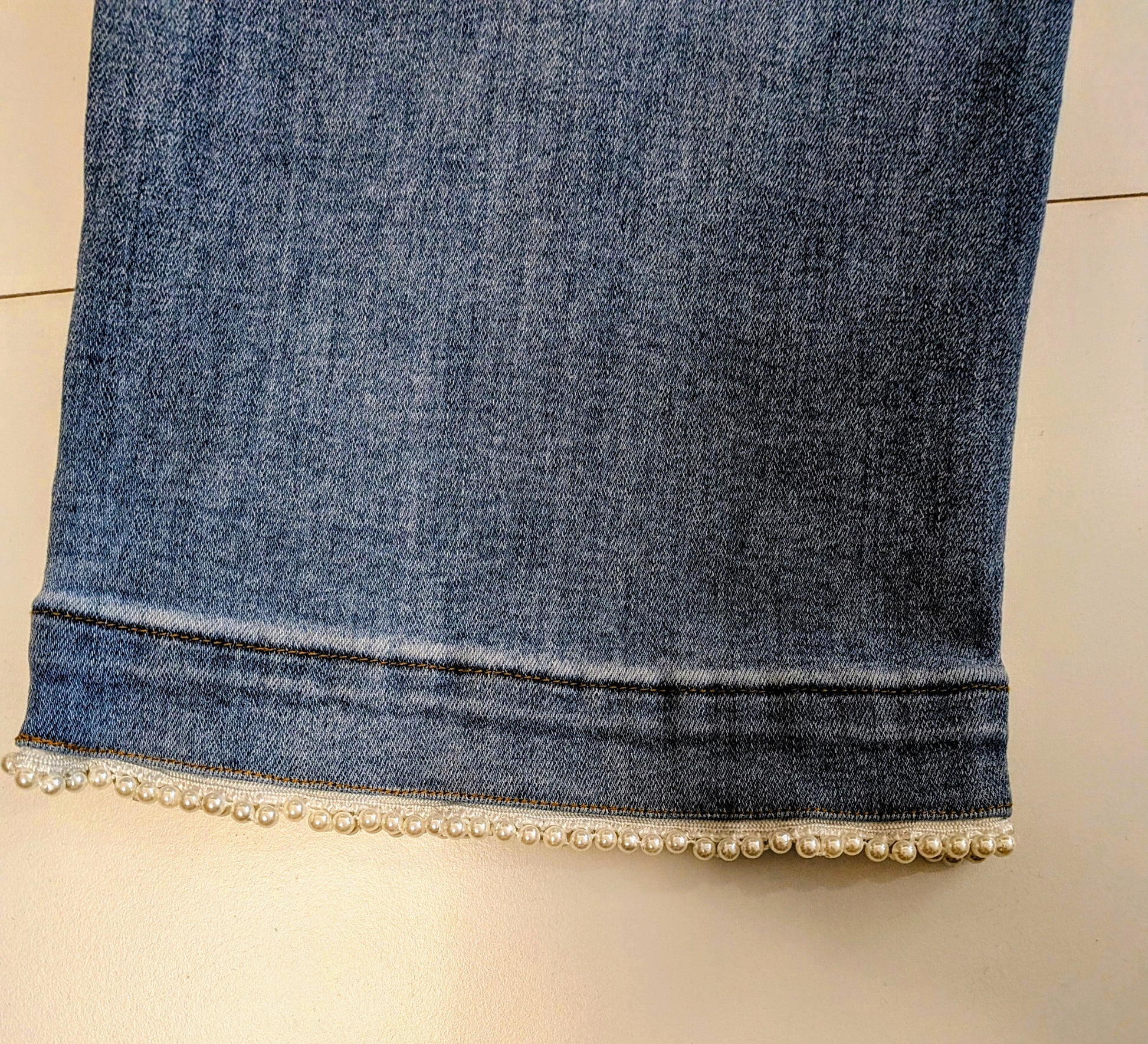 Jeans con applicazioni perline STORE 55